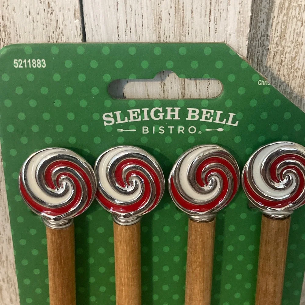 Sleigh Bell Bistro Wooden Spoons with Red Swirl Handles